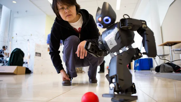 A robot playing soccer.