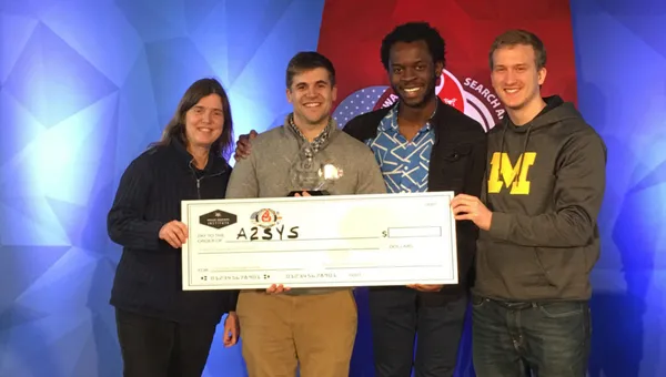 A2Sys Lab poses with award money.