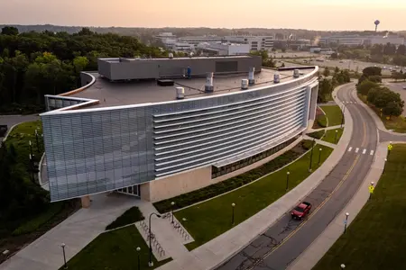 Aerial view of the Ford Robotics Building at sunset on the University of Michigan North Campus