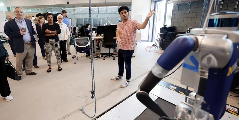 Ram Vasudevan presents legged robotics research to the President's Council of Advisors on Science and Technology.