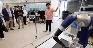 Ram Vasudevan presents legged robotics research to the President's Council of Advisors on Science and Technology.