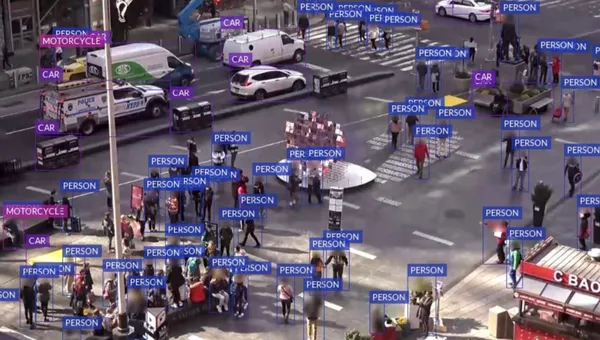 A video feed from a camera in Times Square showing people walking around.